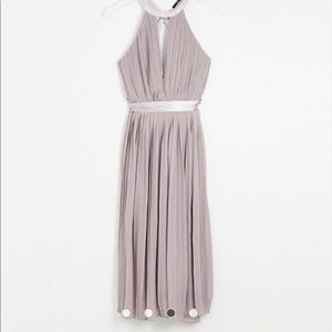 Pleated dress with cross back and bow